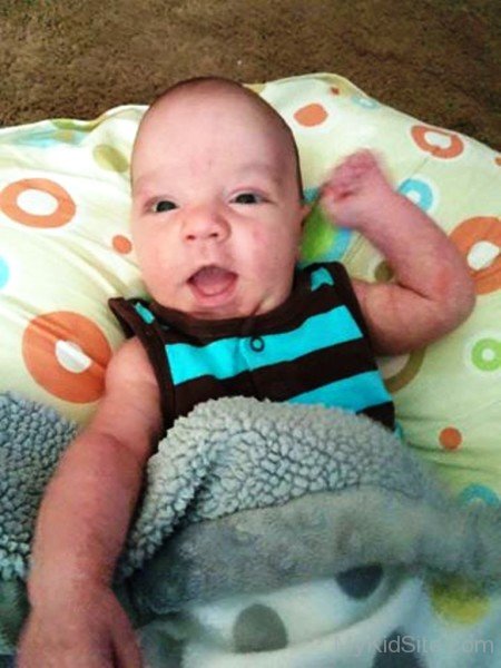 Cutest Baby Boy Smiling On Bed-MK456079