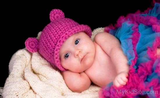 Baby In Pink Hat 