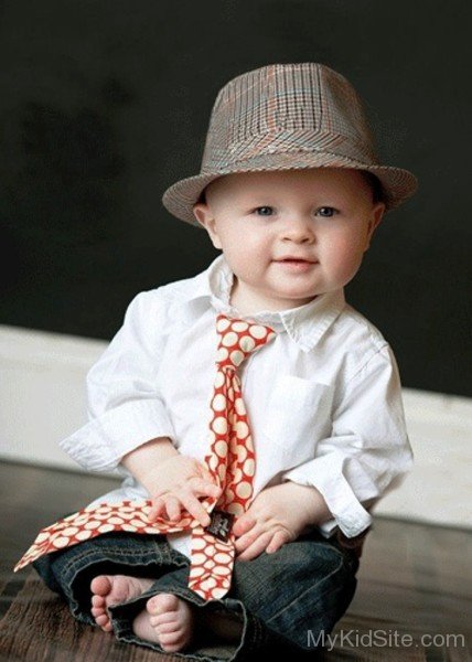 Baby Boy Wearing Brown Hat