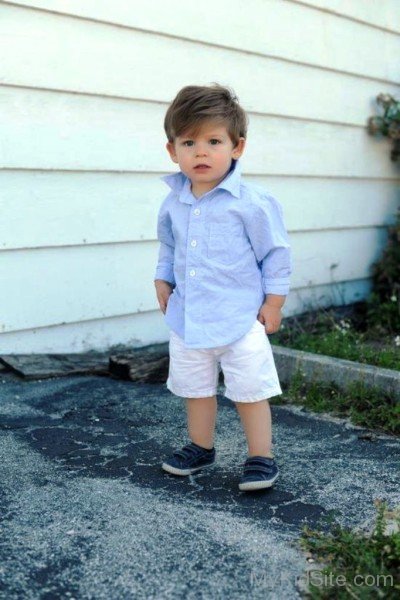 Dashing Baby Boy Standing On Road