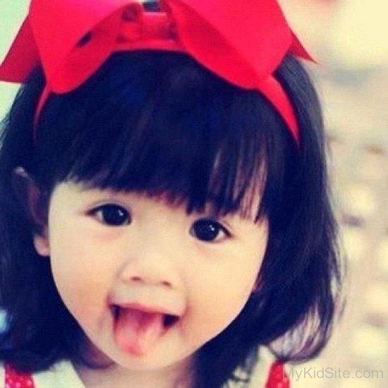 Little Girl Hanging Tongue