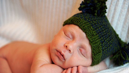Sleeping Baby Boy In Green Hat-MK456118