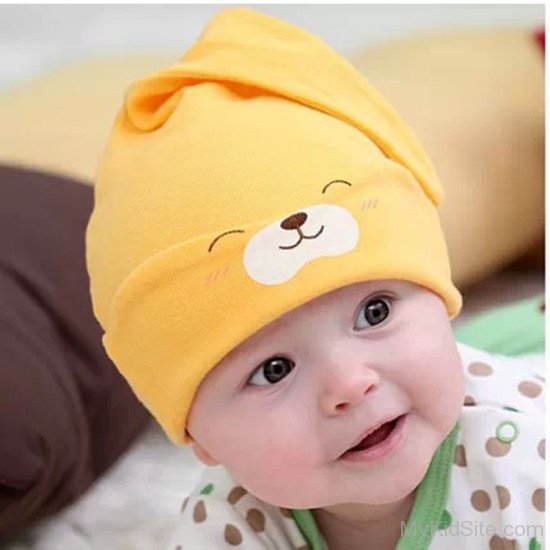Smiling Boy Wearing Yellow Cap-Sn12340