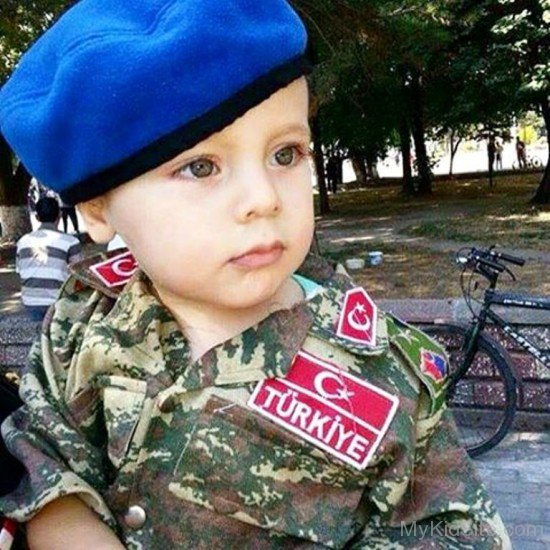 Stylish Baby Boy In Blue Cap