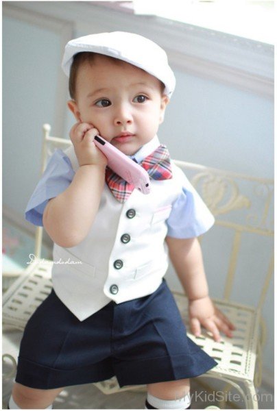 Stylish Baby Boy With Pink Mobile-Sn12347