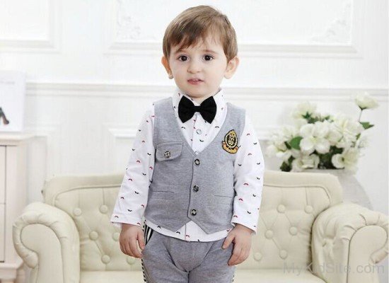 Stylish Boy In Grey Suit