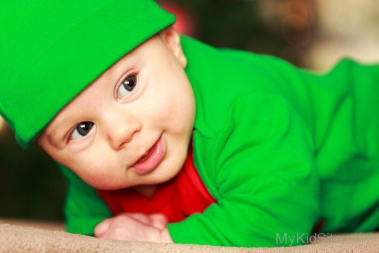 Sweet Baby Boy In Green Dress