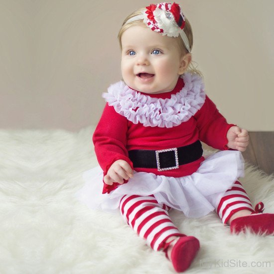 Sweet Baby Girl Wearing Red Band