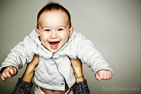 Cute Baby Boy Laughing-MK456150