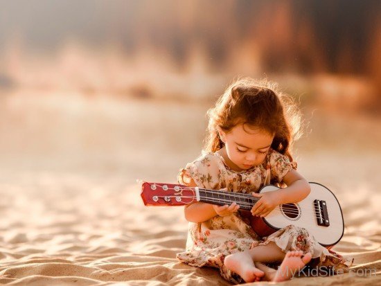 Sweet Girl Palying Guitar