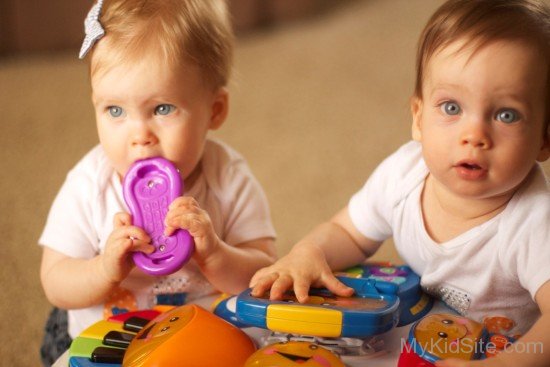 Twins Babies Playing