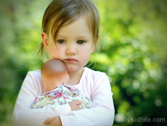Beautiful Baby Girl Holding Toy -kd24