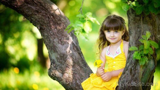 Beautiful Baby Girl In Yellow Dress
