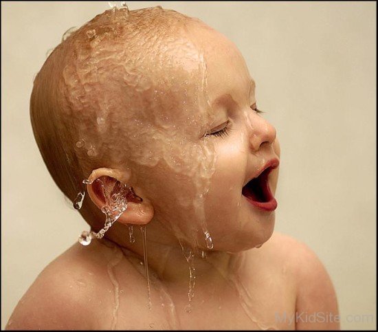 Charming Baby Boy Bathing