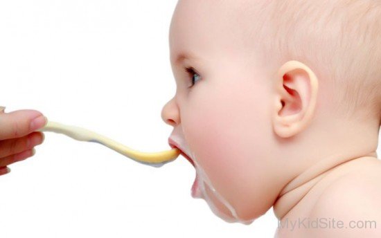 Cute Baby Boy Drinking Milk