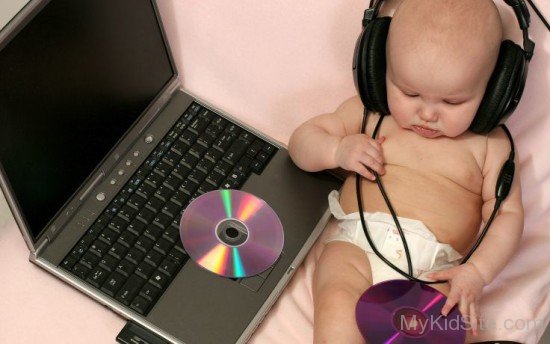 Cute Baby Boy With Laptop