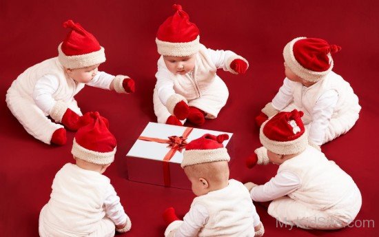 Cute Baby Boys Wearing Santa Cap