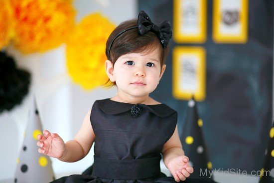 Angel Baby In Black Dress