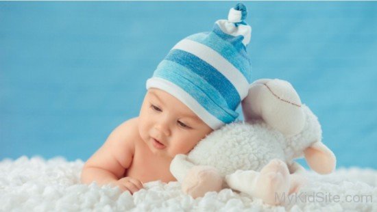 Baby And White Sheep Toy