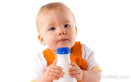 Baby Holds Bottle