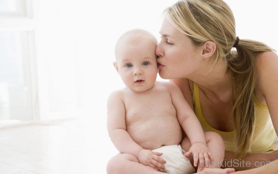 Baby Kissing Loving Mother