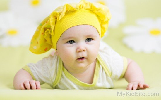 Baby Lying On Green