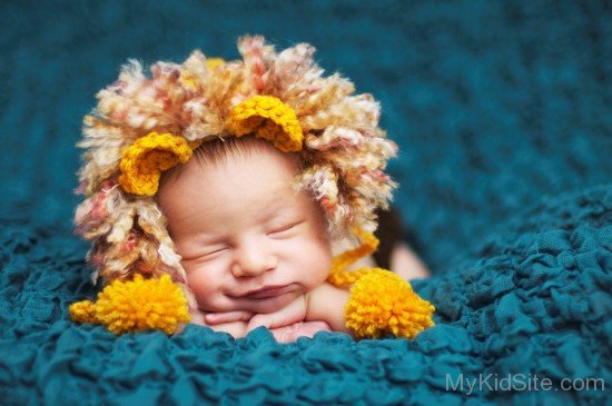 Baby Sleeping On Blue Blanket