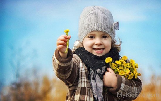 Girl With Spring Flowers Bouquet