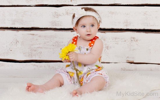 Girl With Yellow Flowers