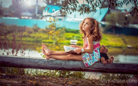 Girl with Teddy Bear