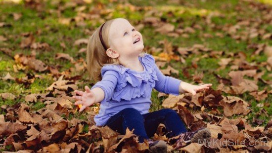 Happy Girl Autumn Leaves