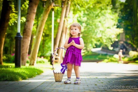 Innocent Girl with Purple Frock
