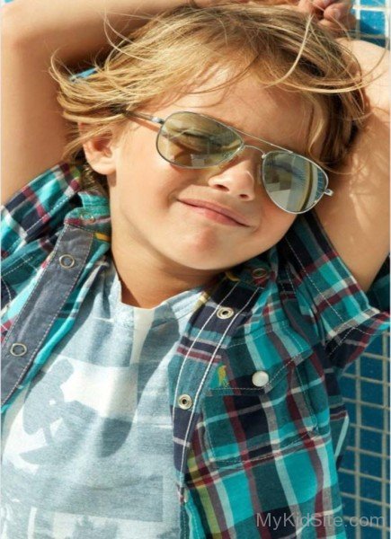 Kid Wears Sunglasses