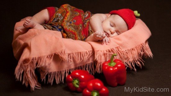 Sleeping Baby And Red Mirchi