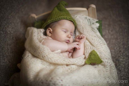 Sleeping Baby Green Cap