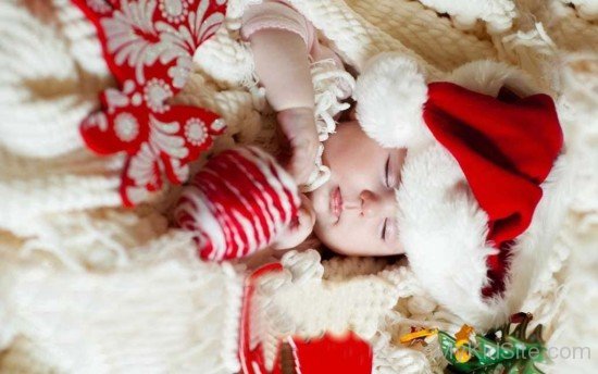Sleeping Baby in Santa Dress